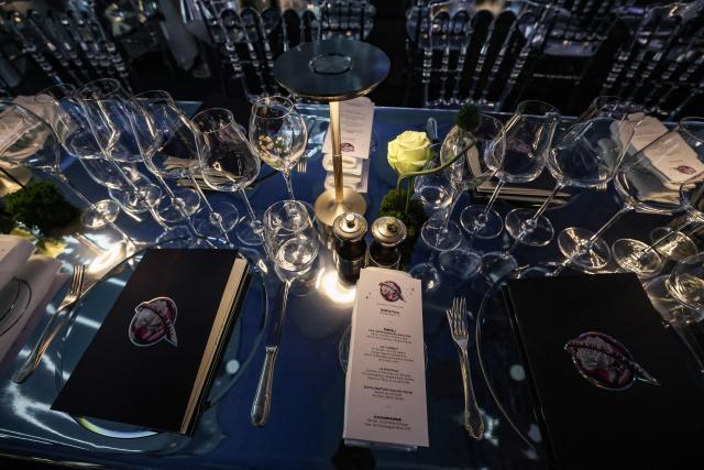 A photo shows the menu ahead of the 70th edition of the "Bal de la Rose" (Rose Ball) event at the Monte-Carlo Sporting Club in Monaco, on March 21, 2026. Created by Princess Grace of Monaco in 1954, The Rose Ball is one of the major charity events in Monaco, and benefits the Princess Grace Foundation. (Photo by Valery HACHE / AFP) / ==== NO TABLOIDS WEB & PRINT, NO DAILY MAIL, NO DAILY MAIL GROUP, NO VOICI, NO CLOSER ====