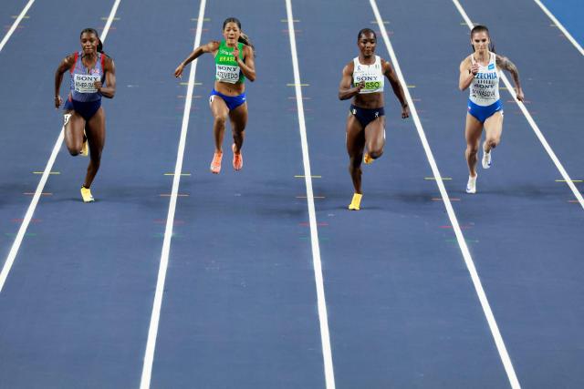 Britain's Dina Asher-Smith (L), Brazil's Ana Azevedo, Italy's Zaynab Dosso and Czech Republic's Karolína Ma?asová compete in the women's 60m semi-final heat 2 during the World Athletics Indoor Championships Kujawy Pomorze 2026 in Torun, Poland on March 21, 2026. (Photo by Wojtek RADWANSKI / AFP)