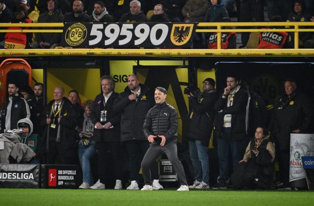 Dortmund's Croatian head coach Niko Kovac (C) reacts at the end of the German first division Bundesliga football match between Borussia Dortmund and HSV Hamburg in Dortmund, western Germany, on March 21, 2026. (Photo by UWE KRAFT / AFP) / DFL REGULATIONS PROHIBIT ANY USE OF PHOTOGRAPHS AS IMAGE SEQUENCES AND/OR QUASI-VIDEO