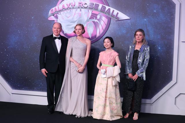 (From L)  Prince Albert II of Monaco, Princess Charlene of Monaco, Japan's Princess Akiko of Mikasa and  Princess Caroline of Hanover, also known as Caroline de Monaco pose upon arrival for the 70th edition of the "Bal de la Rose" (Rose Ball) event at the Monte-Carlo Sporting Club in Monaco, on March 21, 2026. Created by Princess Grace of Monaco in 1954, The Rose Ball is one of the major charity events in Monaco, and benefits the Princess Grace Foundation. (Photo by Valery HACHE / AFP) / ==== NO TABLOIDS WEB & PRINT, NO DAILY MAIL, NO DAILY MAIL GROUP, NO VOICI, NO CLOSER ====