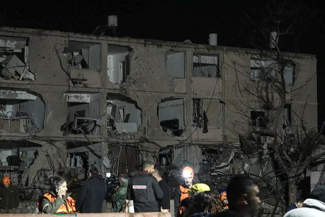 This frame grab from AFPTV footage shows damage to building in the town of Dimona on March 21, 2026. An Iranian missile on March 21, hit the Israeli town of Dimona, home to a nuclear facility, in what the Islamic republic said was retaliation for strikes on its own nuclear site at Natanz. Dimona hosts a facility just outside the main town widely believed to possess the Middle East's sole nuclear arsenal, although Israel has never admitted to possessing nuclear weapons. (Photo by Jorge NOVOMINSKY / AFPTV / AFP) / 