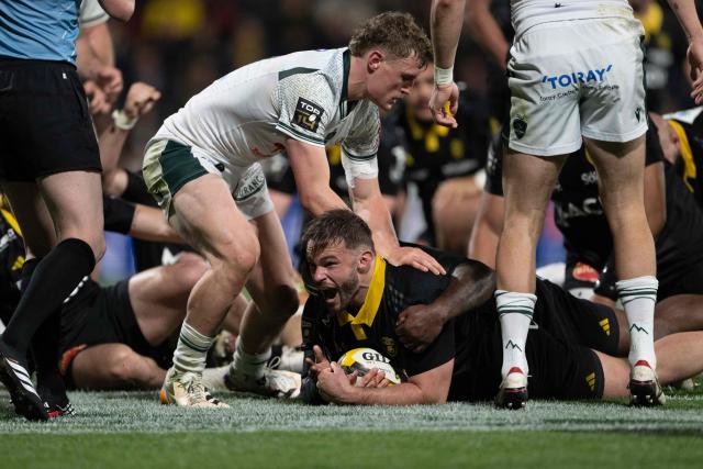 La Rochelle's French hooker Quentin Lespiaucq-Brettes reacts as he scores a try  during the French Top14 rugby union match between Stade Rochelais (La Rochelle) and Section Paloise (Pau) at The Marcel-Deflandre Stadium in La Rochelle, western France, on March 21, 2026.# (Photo by XAVIER LEOTY / AFP)