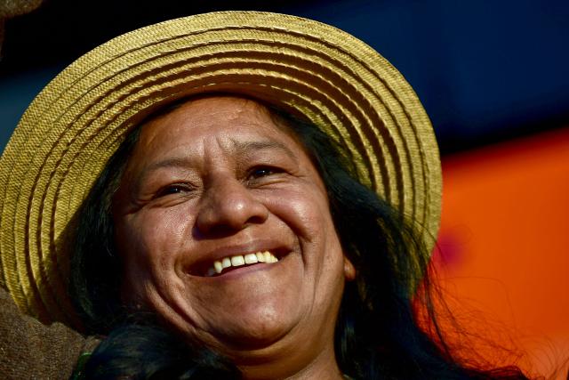 Aida Quilcue, who is running for Vice-President with Colombia's presidential candidate from the ruling party Pacto Historico, Ivan Cepeda, smiles during a campaign rally in Ciudad Bolivar district, southern Bogota on March 21, 2026. Colombia will hold presidential elections on May 31. (Photo by Pablo VERA / AFP)