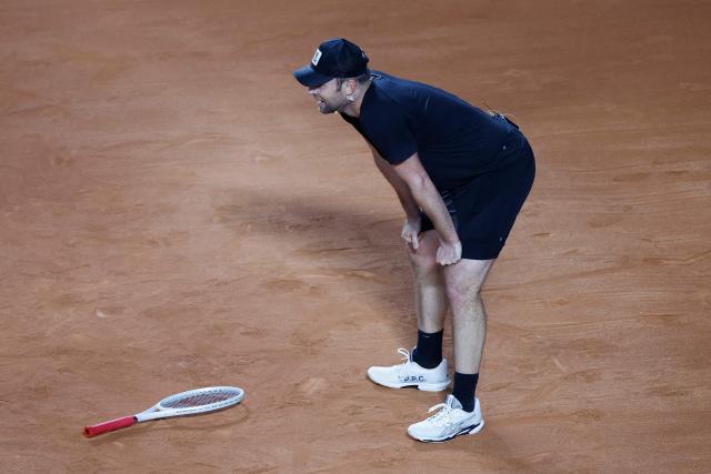 US former player Andrew Roddick returns during an exhibition match against Argentina's former tennis players Diego Schwartzman (L) and Juan Martin Del Potro ahead of the Latin America Open Tournament in Sao Paulo, Brazil on March 21, 2026. (Photo by Miguel SCHINCARIOL / AFP)