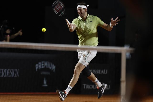 Argentine former tennis player Juan Martin Del Potro returns during an exhibition match against Brazil's former player Fernando Meligeni (L) and US former player Andrew Roddick ahead of the Latin America Open Tournament in Sao Paulo, Brazil on March 21, 2026. (Photo by Miguel SCHINCARIOL / AFP)