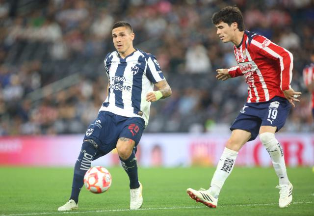 Monterrey's Montenegrin forward #20 Uros Djurdevic and Guadalajara's defender #19 Diego Campillo during the Liga MX Clausura football match between Monterrey and Guadalajara at the BBVA Stadium in Monterrey, Mexico, on March 21, 2026. (Photo by Julio Cesar AGUILAR / AFP)