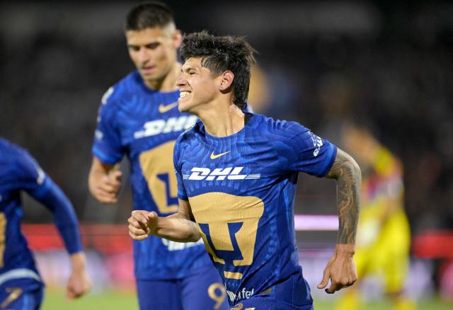 Pumas' Paraguayan forward #31 Robert Morales celebrates after scoring a late goal from the penalty spot to win during the Liga MX Clausura match between Pumas and America at Olimpico Universitario Stadium in Mexico City on March 21, 2026. (Photo by Alfredo ESTRELLA / AFP)