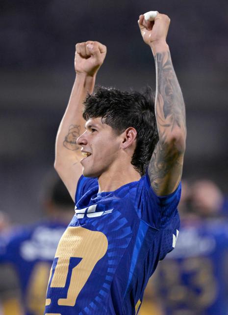 Pumas' Paraguayan forward #31 Robert Morales celebrates after scoring a late goal from the penalty spot to win during the Liga MX Clausura match between Pumas and America at Olimpico Universitario Stadium in Mexico City on March 21, 2026. (Photo by Alfredo ESTRELLA / AFP)
