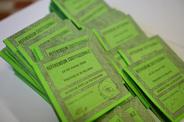 A picture shows ballots in a polling station on the first day to vote for the Italian constitutional referendum on justice reform, in Milan, on March 22, 2026. (Photo by Piero CRUCIATTI / AFP)