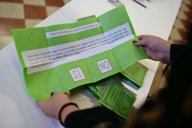 A picture shows ballots in a polling station on the first day to vote for the Italian constitutional referendum on justice reform, in Milan, on March 22, 2026. (Photo by Piero CRUCIATTI / AFP)