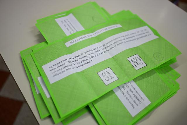 A picture shows ballots in a polling station on the first day to vote for the Italian constitutional referendum on justice reform, in Milan, on March 22, 2026. (Photo by Piero CRUCIATTI / AFP)