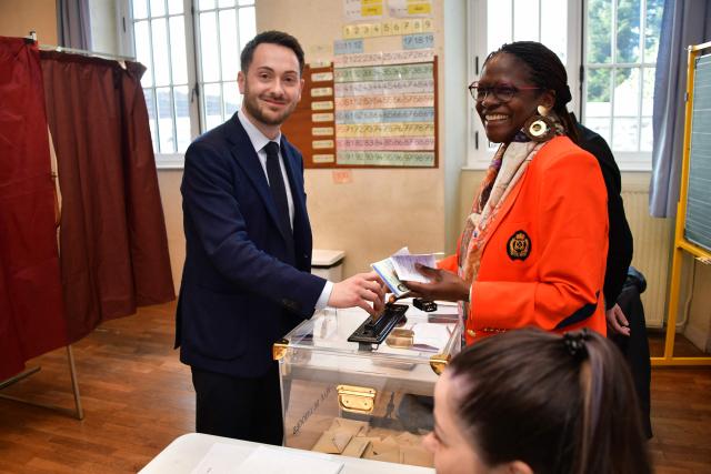 La France Insoumise (LFI) MP and Limoges' left-wing Popular Front - Union of the Social Left and The Ecologistes mayoral candidate Damien Maudet casts his vote during the second round of France's 2026 municipal elections in Limoges, central France on March 22, 2026. (Photo by Pascal LACHENAUD / AFP)