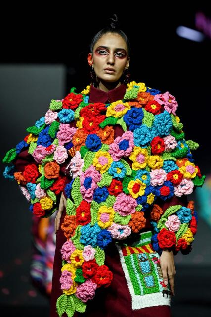 A model presents a creation by FDCI x Pearl Academy First Cut during the Lakmé Fashion Week in Mumbai on March 22, 2026. (Photo by Sujit JAISWAL / AFP)