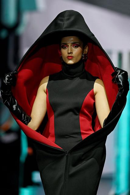 A model presents a creation by FDCI x Pearl Academy First Cut during the Lakmé Fashion Week in Mumbai on March 22, 2026. (Photo by Sujit JAISWAL / AFP)