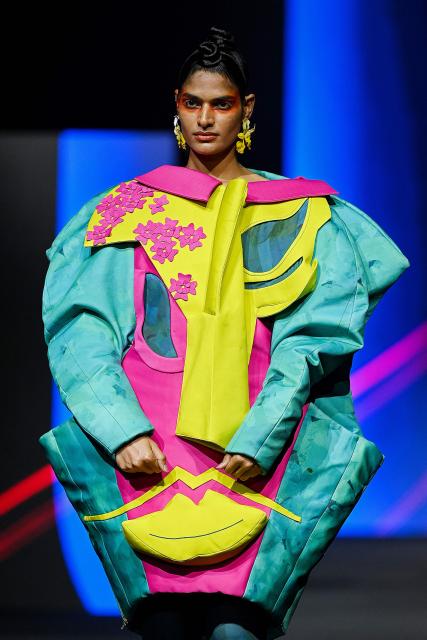 A model presents a creation by FDCI x Pearl Academy First Cut during the Lakmé Fashion Week in Mumbai on March 22, 2026. (Photo by Sujit JAISWAL / AFP)