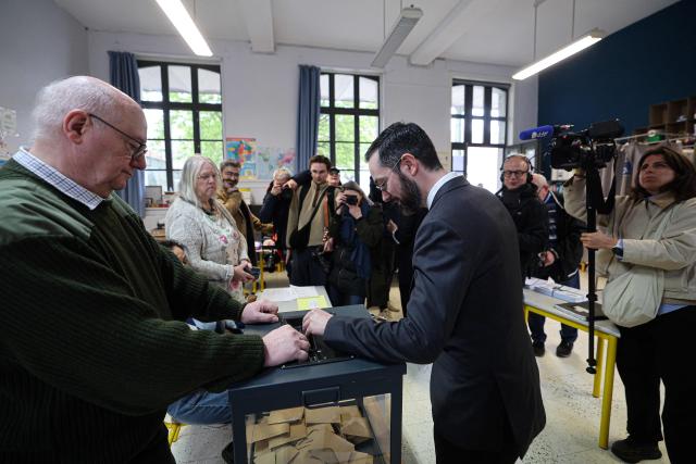 Roubaix' Left-wing La France Insoumise (LFI, Unbowed France) mayoral candidate David Guiraud casts his vote during the second round of France's 2026 municipal elections in Roubaix, northern France on March 22, 2026. (Photo by Francois LO PRESTI / AFP)
