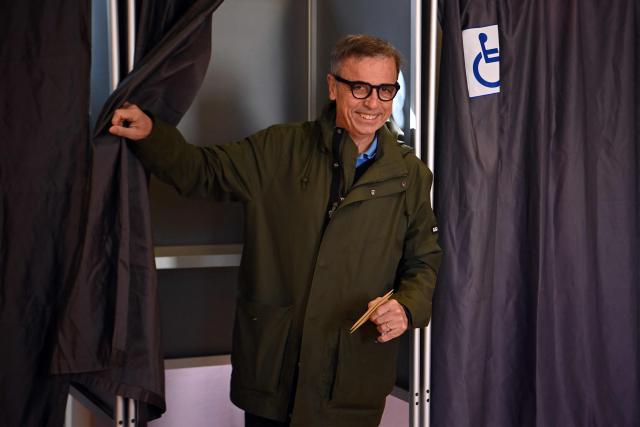 Ecologist incumbent mayor of Bordeaux and mayoral candidate Pierre Hurmic leaves the polling booth before casting his ballot during the second round of France's 2026 municipal elections in Bordeaux, southwestern France on March 22, 2026. (Photo by Christophe ARCHAMBAULT / AFP)