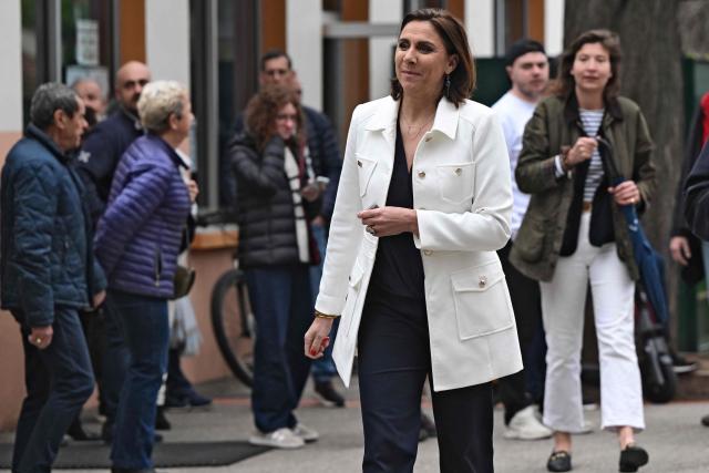 Far-right party Rassemblement National (RN) MP and mayoral candidate Laure Lavalette leaves the polling station after voting for the second round of France's 2026 municipal elections in Toulon, southern France on March 22, 2026. (Photo by Miguel MEDINA / AFP)
