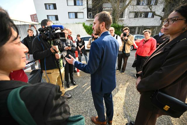 France's left-wing party La France Insoumise (LFI) MP and Toulouse's mayoral candidate François Piquemal (C) speaks to the press after casting his vote during the second round of France's 2026 municipal elections in Toulouse, southwestern France on March 22, 2026. (Photo by Lionel BONAVENTURE / AFP)