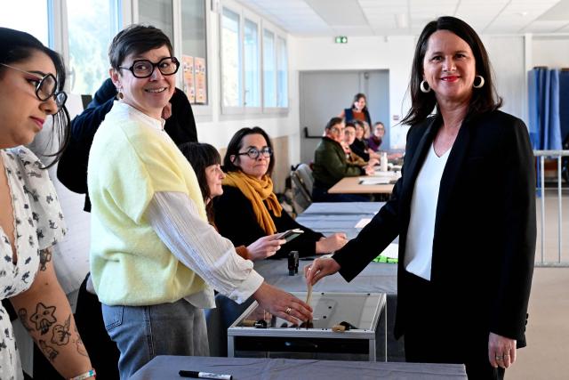 Nantes' incumbent mayor and broad left-wing coalition candidate for re-election, Socialist Party (PS) member Johanna Rolland casts her ballot during the second round of France's 2026 municipal elections in Nantes, western France on March 22, 2026. (Photo by Sebastien Salom-Gomis / AFP)