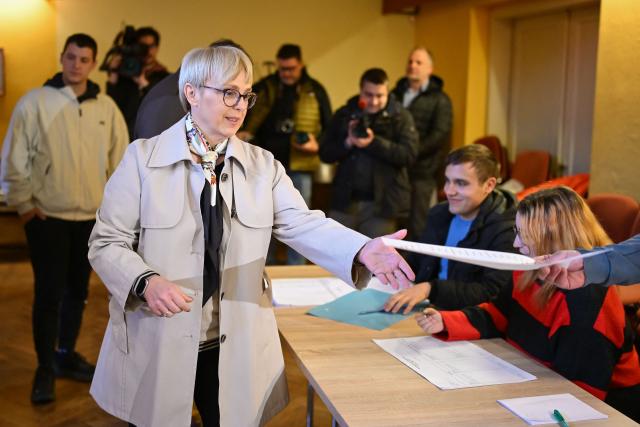Slovenia’s President Natasa Pirc Musar arrives at a polling station to cast her vote during the general election in Radomlje on March 22, 2026. Slovenians are voting in tight parliamentary elections, with the conservatives of veteran politician Janez Jansa, an admirer of US President Donald Trump, eyeing a comeback. A Jansa return could see the ex-Yugoslav nation, a European Union member of two million people, take an illiberal turn again after four years of centre-left rule under liberal Prime Minister Robert Golob. (Photo by Jure Makovec / AFP)