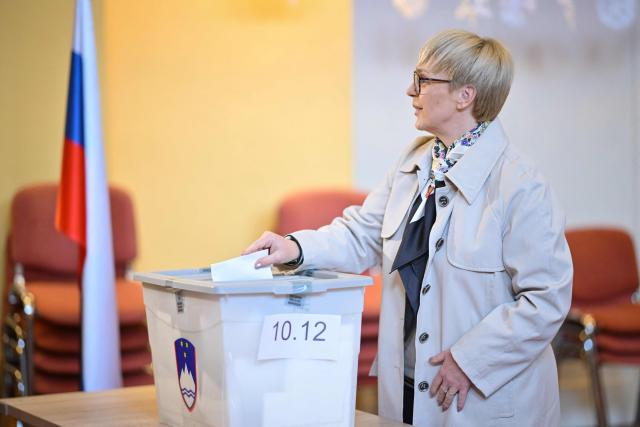 Slovenia’s President Natasa Pirc Musar casts her vote at a polling station during the general election in Radomlje on March 22, 2026. Slovenians are voting in tight parliamentary elections, with the conservatives of veteran politician Janez Jansa, an admirer of US President Donald Trump, eyeing a comeback. A Jansa return could see the ex-Yugoslav nation, a European Union member of two million people, take an illiberal turn again after four years of centre-left rule under liberal Prime Minister Robert Golob. (Photo by Jure Makovec / AFP)