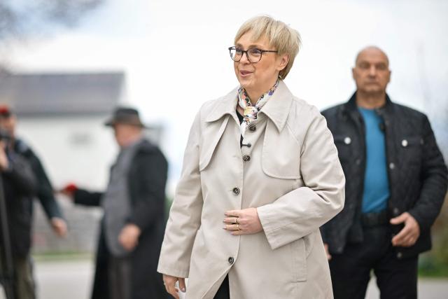 Slovenias President Natasa Pirc Musar walks from a polling station after casting her vote during the general election in Radomlje on March 22, 2026. Slovenians are voting in tight parliamentary elections, with the conservatives of veteran politician Janez Jansa, an admirer of US President Donald Trump, eyeing a comeback. A Jansa return could see the ex-Yugoslav nation, a European Union member of two million people, take an illiberal turn again after four years of centre-left rule under liberal Prime Minister Robert Golob. (Photo by Jure Makovec / AFP)