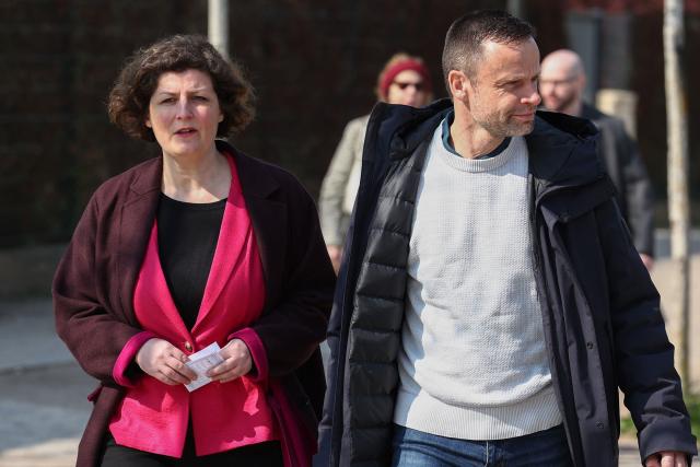 Strasbourg's incumbent mayor and Les Ecologistes candidate for re-election Jeanne Barseghian (L) arrives at a polling station to vote during the second round of France's 2026 municipal elections in Strasbourg, eastern France on March 22, 2026. (Photo by FREDERICK FLORIN / AFP)