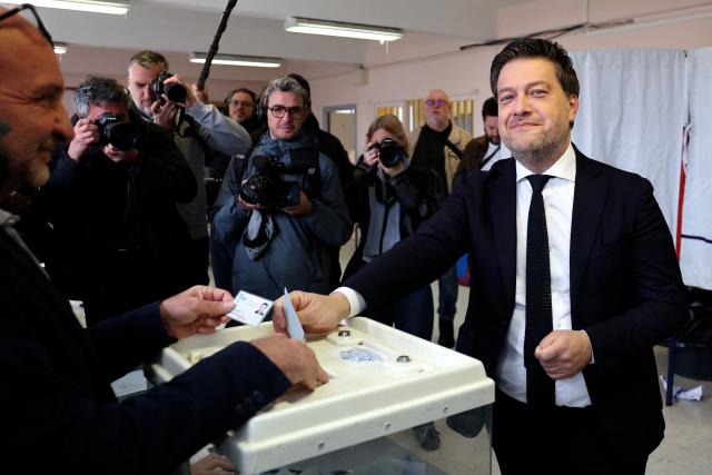 Marseille's incumbent mayor and broad left-wing coalition Printemps Marseillais candidate for re-election Benoit Payan casts his ballot during the second round of France's 2026 municipal elections in Marseille, southern France on March 22, 2026. (Photo by Pascal POCHARD-CASABIANCA / AFP)