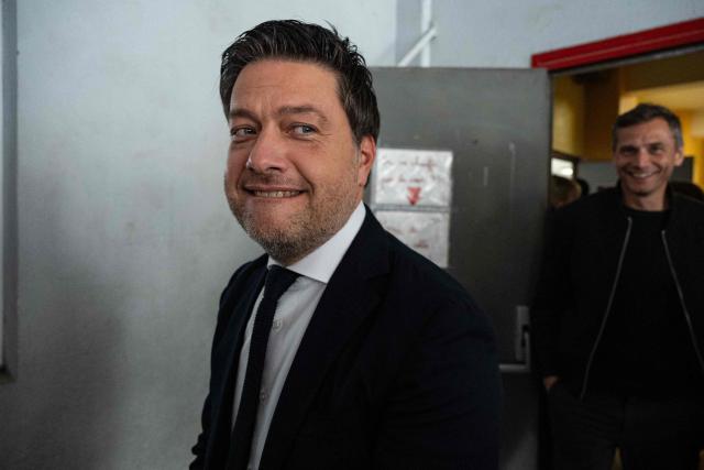 TOPSHOT - Marseille's incumbent mayor and broad left-wing coalition Printemps Marseillais candidate for re-election Benoit Payan leaves the polling station after voting during the second round of France's 2026 municipal elections in Marseille, southern France on March 22, 2026. (Photo by Elodie CLEMENT / AFP)