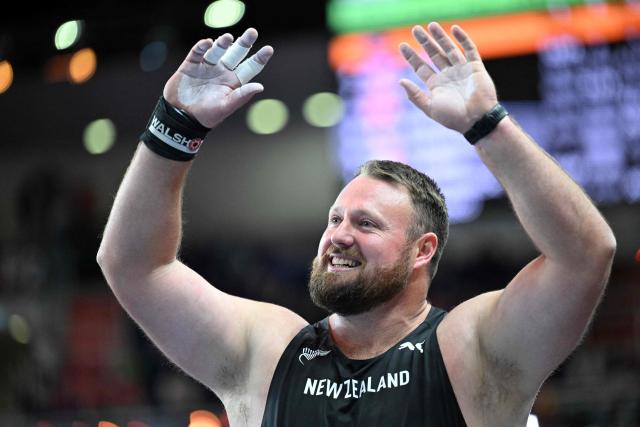 New Zealand's Tom Walsh celebrates after the men's final shot put event during the World Athletics Indoor Championships Kujawy Pomorze 2026 in Torun, Poland on March 22, 2026. (Photo by Kirill KUDRYAVTSEV / AFP)