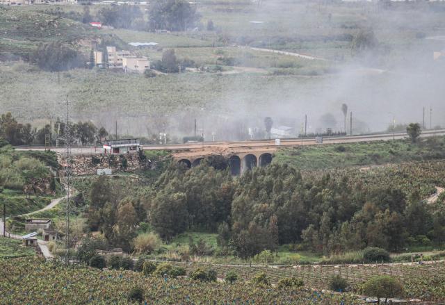 The damaged Qasmiyeh bridge located on a main highway linking villages in the Tyre district with others further north, following an Israeli airstrike in southern Lebanon on March 22, 2026. Israel's military struck a key bridge in south Lebanon on Sunday, an AFP correspondent said, after Israel's defence minister said the army had been ordered to destroy more bridges over the Litani River. Lebanon was drawn into the Middle East war on March 2, when pro-Iran Hezbollah launched rockets towards Israel in response to US-Israeli strikes that killed Iranian supreme leader on February 28, 2026. (Photo by Kawnat HAJU / AFP) / 