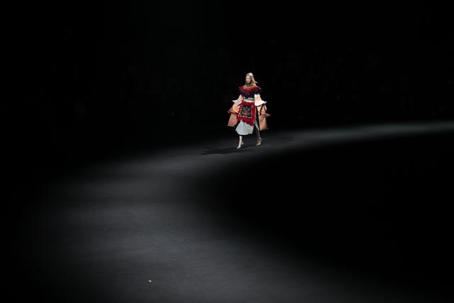 A model presents creations by "The Urban Plette" Weaving Starry Dreams China International Children Designer Competition during the Beijing Fashion Week in Beijing on March 22, 2026. (Photo by Pedro PARDO / AFP)