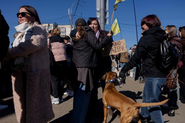 Natalia Kravtsova (C), 52 yo, mother of an Azov fighter detained since 2022 take part in a rally for Ukrainian prisoners of war calling to speed up their exchange in Kyiv on March 22, 2026, amid the Russian invasion of Ukraine. (Photo by Tetiana DZHAFAROVA / AFP)