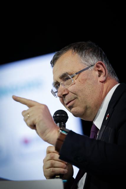 (FILES) Chairman and CEO of TotalEnergies Patrick Pouyanne speaks during the Euronext 13th annual conference in Paris on March 18, 2025. If the war in the Middle East drags out more than six months, economies around the world would suffer "real impacts", the head of French oil giant TotalEnergies said on March 18, 2025. (Photo by Thibaud MORITZ / AFP)