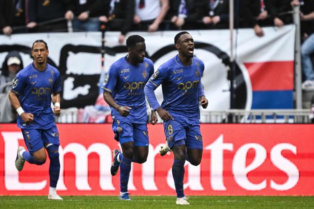 Monaco’s US forward #09 Folarin Balogun (R) celebrates after scoring a goal during the French L1 football match between Olympique Lyonnais (OL) and AS Monaco (ASM) at the Groupama Stadium in Decines-Charpieu, central-eastern France on March 22, 2026. (Photo by JEFF PACHOUD / AFP)
