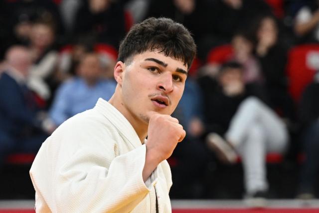 Georgia's Luka Javakhishvili reacts after winning the men's under 90 kg bronze medal bout at the Tbilisi Grand Slam judo tournament in Tbilisi on March 22, 2026. (Photo by Vano SHLAMOV / AFP)