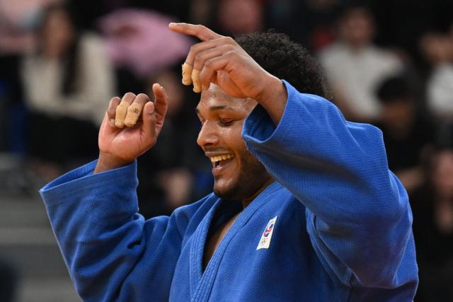 Dominican Republic's Robert Florentino reacts after winning the men's under 100 kg bronze medal bout at the Tbilisi Grand Slam judo tournament in Tbilisi on March 22, 2026. (Photo by Vano SHLAMOV / AFP)