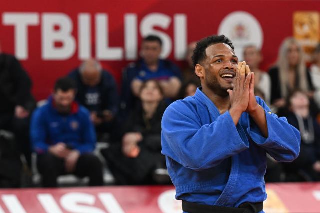 Dominican Republic's Robert Florentino reacts after winning the men's under 100 kg bronze medal bout at the Tbilisi Grand Slam judo tournament in Tbilisi on March 22, 2026. (Photo by Vano SHLAMOV / AFP)