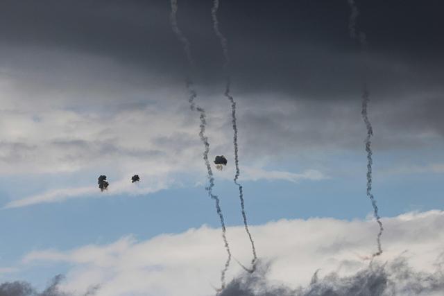 Israeli Iron Dome interceptor detonate in the sky close to the Israel-Lebanon border, in the Upper Galilee in northern Israel on March 22, 2026. Lebanon was drawn into the Middle East war on March 2, when pro-Iran Hezbollah launched rockets towards Israel in response to US-Israeli strikes that killed Iranian supreme leader on February 28. (Photo by Jalaa MAREY / AFP) / 