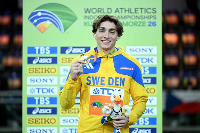 Gold medallist Sweden's Armand Duplantis celebrates on the podium for the men's pole vault event during the World Athletics Indoor Championships Kujawy Pomorze 2026 in Torun, Poland on March 22, 2026. (Photo by Kirill KUDRYAVTSEV / AFP)