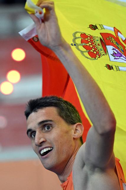 Spain's Mariano García celebrates after the men's final 1500 metres event during the World Athletics Indoor Championships Kujawy Pomorze 2026 in Torun, Poland on March 22, 2026. (Photo by Kirill KUDRYAVTSEV / AFP)