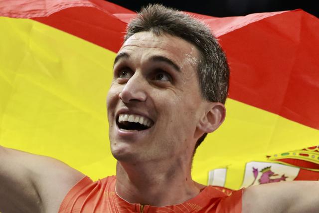 First placed Spain's Mariano García celebrates after competing in the men's final 1500 metres event during the World Athletics Indoor Championships Kujawy Pomorze 2026 in Torun, Poland on March 22, 2026. (Photo by Wojtek RADWANSKI / AFP)