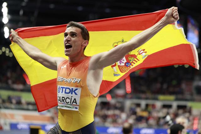 First placed Spain's Mariano García celebrates after competing in the men's final 1500 metres event during the World Athletics Indoor Championships Kujawy Pomorze 2026 in Torun, Poland on March 22, 2026. (Photo by Wojtek RADWANSKI / AFP)