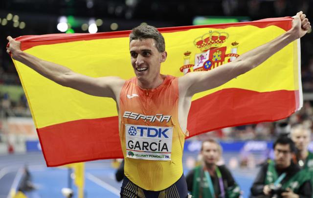 First placed Spain's Mariano García celebrates after competing in the men's final 1500 metres event during the World Athletics Indoor Championships Kujawy Pomorze 2026 in Torun, Poland on March 22, 2026. (Photo by Wojtek RADWANSKI / AFP)