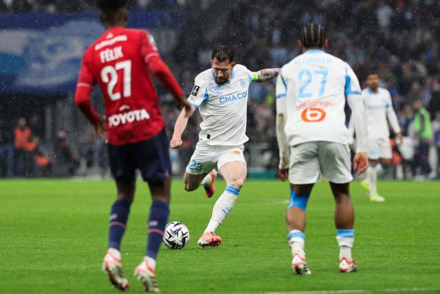 Marseille's Danish midfielder #23 Pierre-Emile Hojbjerg shoots the ball during the French L1 football match between Olympique de Marseille (OM) and Lille OSC at the Stade Velodrome in Marseille, southern France on March 22, 2026. (Photo by Pascal POCHARD-CASABIANCA / AFP)