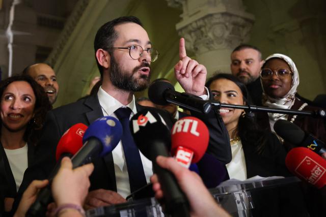 Roubaix' Left-wing La France Insoumise (LFI, Unbowed France) mayoral candidate David Guiraud (C) speaks at the party's rally after winning the second round of France's 2026 municipal elections in Roubaix, northern France on March 22, 2026. (Photo by Francois LO PRESTI / AFP)