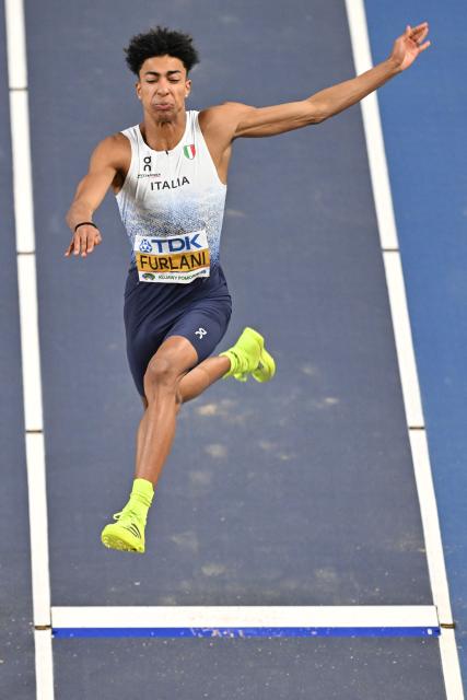 Italy's Mattia Furlani competes in the men's final long jump event during the World Athletics Indoor Championships Kujawy Pomorze 2026 in Torun, Poland on March 22, 2026. (Photo by Andrej ISAKOVIC / AFP)