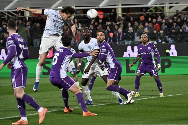 Inter Milan's Italian forward #94 Pio Esposito scores his team's first goal during the Italian Serie A football match between Fiorentina and Inter Milan at the Artemio Franchi Stadium in Florence on March 22, 2026. (Photo by Tiziana FABI / AFP)