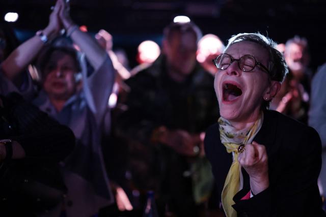 Supporters of Strasbourg's left-wing Parti Socialiste's (PS) mayoral candidate Catherine Trautmann react after winning following the second round of France's 2026 municipal elections in Strasbourg, eastern France on March 22, 2026. (Photo by Romeo BOETZLE / AFP)